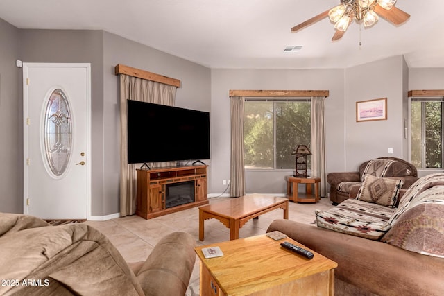 5271 E 10th Ave, Apache Junction, AZ 85119 - living area with ceiling fan and a glass covered fireplace