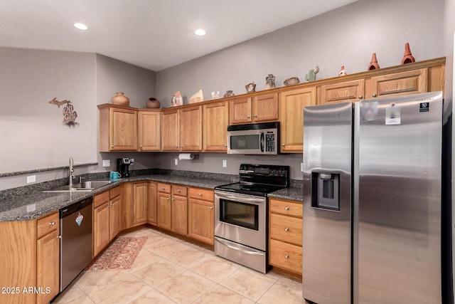 5271 E 10th Ave, Apache Junction, AZ 85119 - kitchen featuring stainless steel appliances, light tile patterned floors, dark stone counters, recessed lighting, and a peninsula