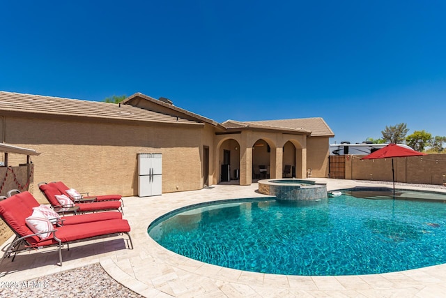 5271 E 10th Ave, Apache Junction, AZ 85119 - view of swimming pool featuring a patio and a pool with connected hot tub
