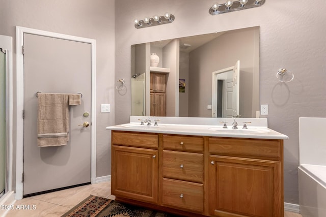 5271 E 10th Ave, Apache Junction, AZ 85119 - bathroom with double vanity, tile patterned flooring, and a shower with shower door