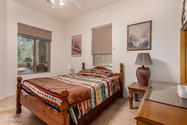 5271 E 10th Ave, Apache Junction, AZ 85119 - bedroom with light tile patterned floors and ceiling fan