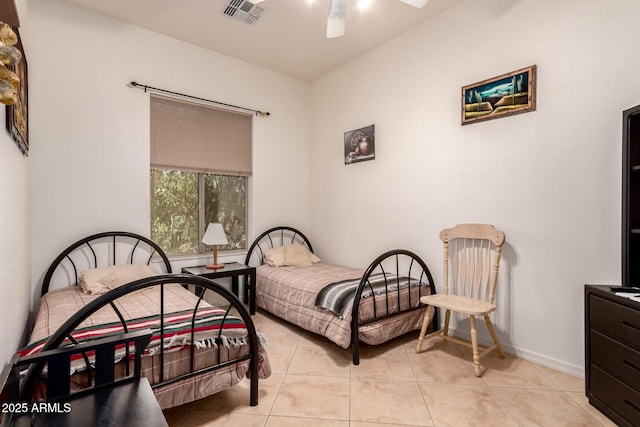 5271 E 10th Ave, Apache Junction, AZ 85119 - bedroom with light tile patterned floors and ceiling fan