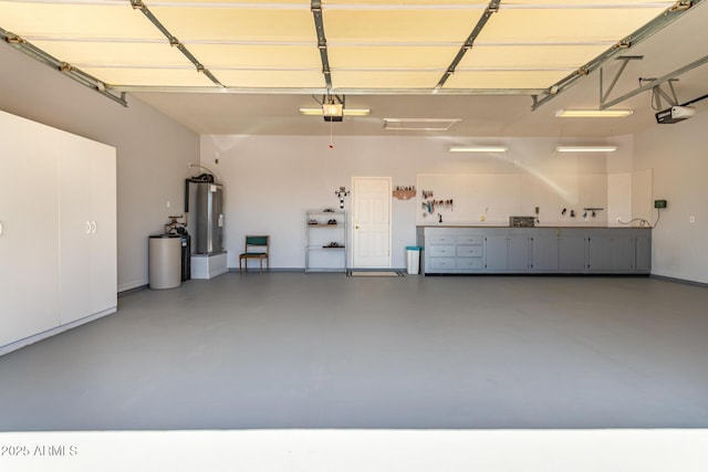 5271 E 10th Ave, Apache Junction, AZ 85119 - garage featuring water heater and a garage door opener