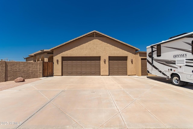 5271 E 10th Ave, Apache Junction, AZ 85119 - single story home featuring driveway, an attached garage, and stucco siding