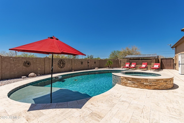 5271 E 10th Ave, Apache Junction, AZ 85119 - view of pool with a fenced backyard, a patio, and a pool with connected hot tub