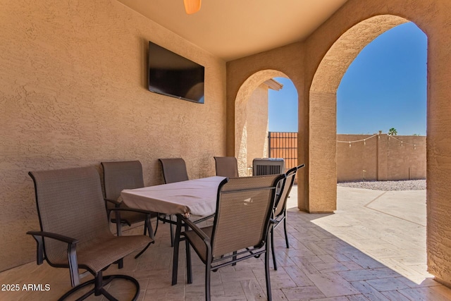 5271 E 10th Ave, Apache Junction, AZ 85119 - fenced backyard featuring a patio area and outdoor dining space