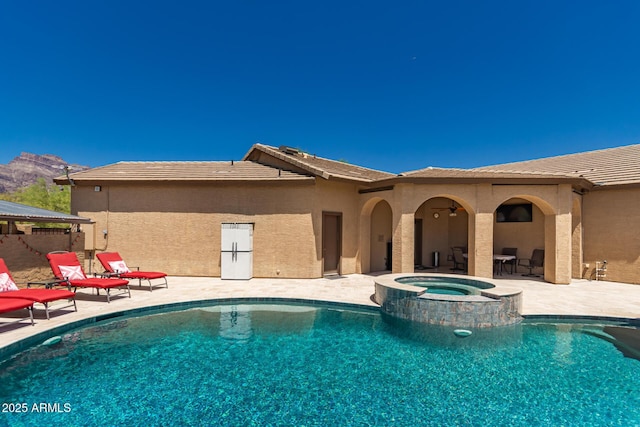 5271 E 10th Ave, Apache Junction, AZ 85119 - view of swimming pool featuring a patio and a pool with connected hot tub
