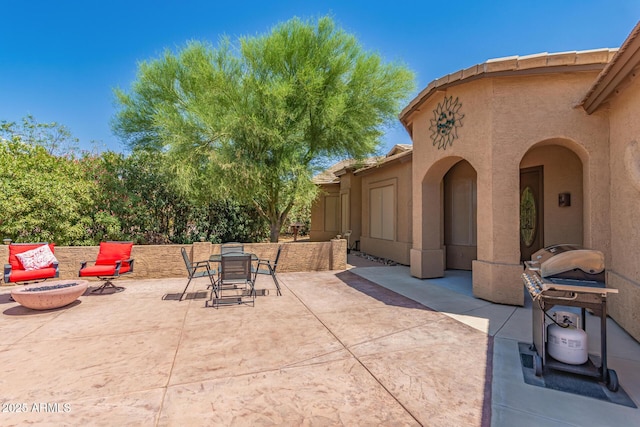 5271 E 10th Ave, Apache Junction, AZ 85119 - view of patio with a fire pit, outdoor dining space, and area for grilling