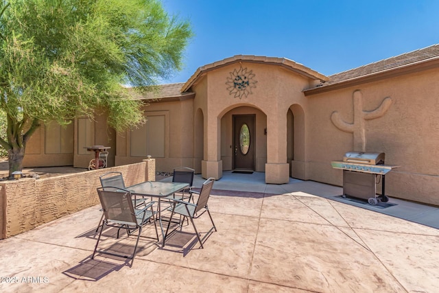5271 E 10th Ave, Apache Junction, AZ 85119 - view of patio featuring a grill and outdoor dining area