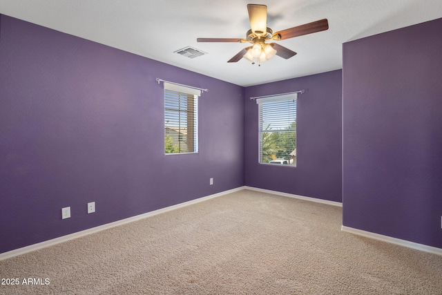 2614 E Carob Dr, Gilbert, AZ 85298 - carpeted empty room featuring a ceiling fan and baseboards