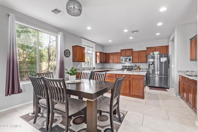 dining area featuring light tile patterned flooring, visible vents, and recessed lighting