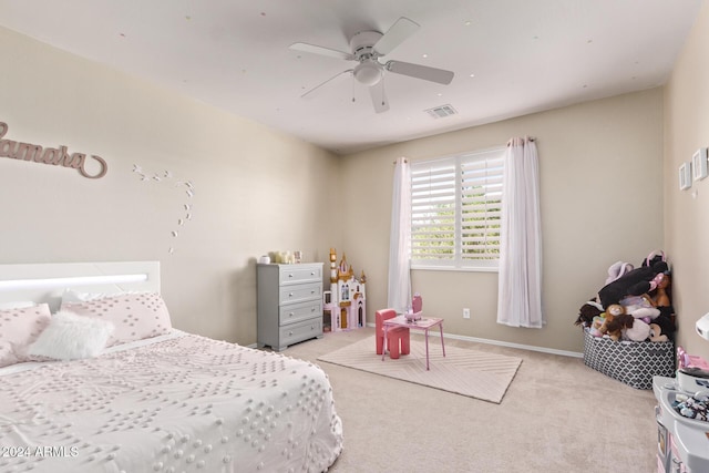 bedroom featuring visible vents, a ceiling fan, baseboards, and carpet floors