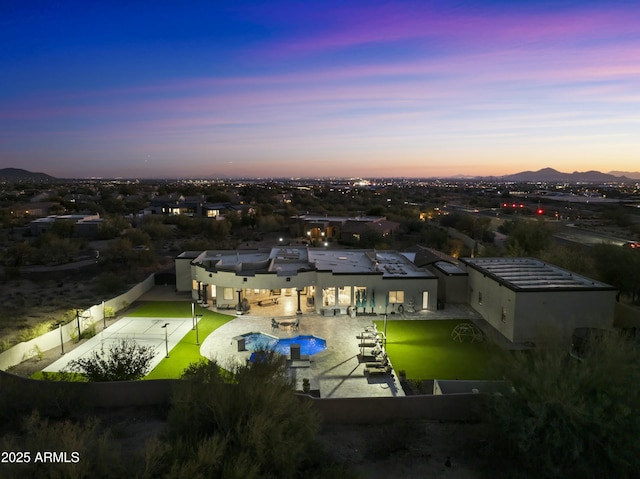 aerial view at dusk with a mountain view