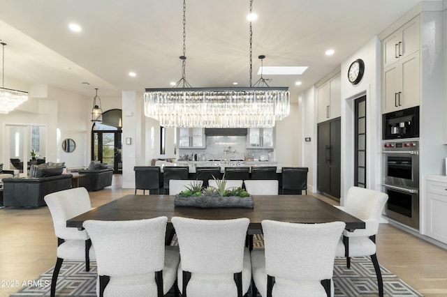 dining area with light wood-type flooring