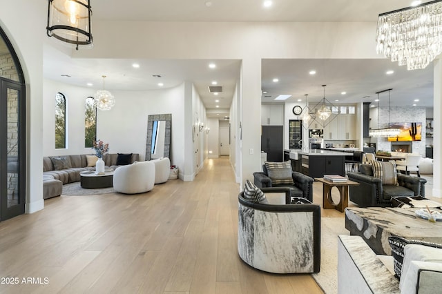 living room with light hardwood / wood-style flooring