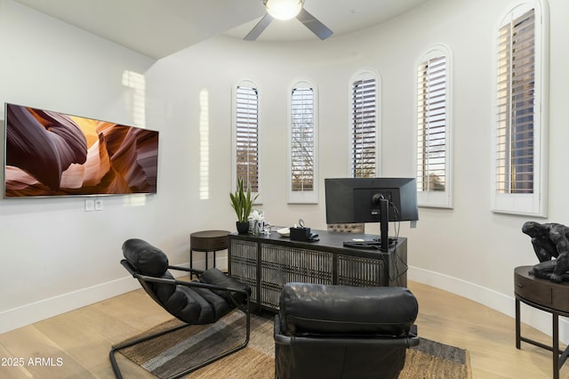 office featuring light wood-type flooring and ceiling fan