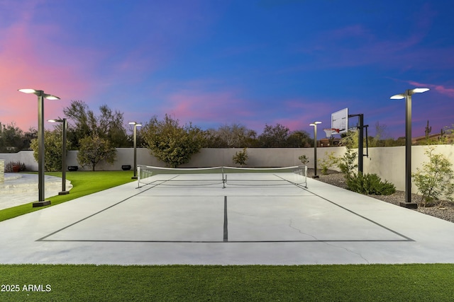 view of basketball court featuring tennis court