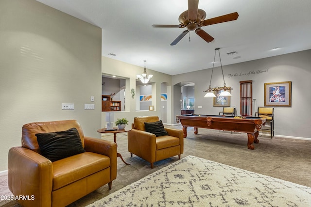 rec room featuring visible vents, arched walkways, a ceiling fan, baseboards, and carpet flooring