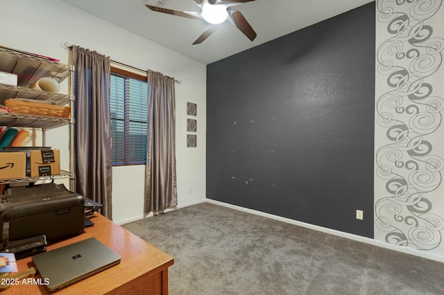 office area with carpet floors, baseboards, and a ceiling fan