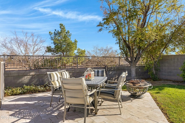 view of patio / terrace featuring outdoor dining area and a fenced backyard