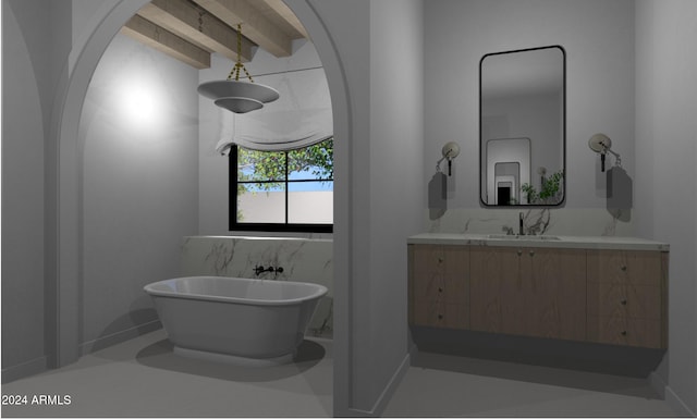 bathroom featuring beamed ceiling, vanity, and a tub to relax in