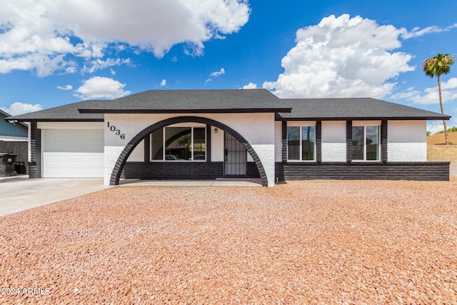 view of front of property featuring a garage