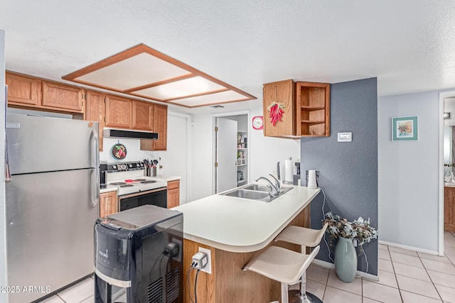 2020 W Union Hills Dr Unit 156, Phoenix, AZ 85027 - kitchen with freestanding refrigerator, white electric stove, a peninsula, range hood, and light tile patterned floors