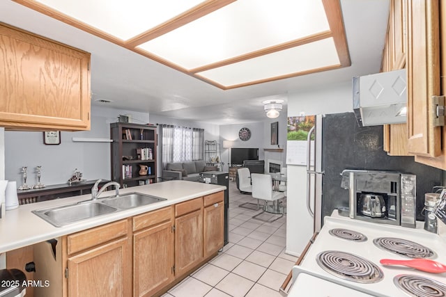 2020 W Union Hills Dr Unit 156, Phoenix, AZ 85027 - kitchen featuring light tile patterned flooring, open floor plan, white electric stove, a peninsula, and light countertops