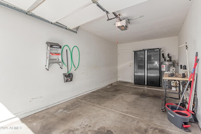 2020 W Union Hills Dr Unit 156, Phoenix, AZ 85027 - garage featuring water heater, a garage door opener, and refrigerator