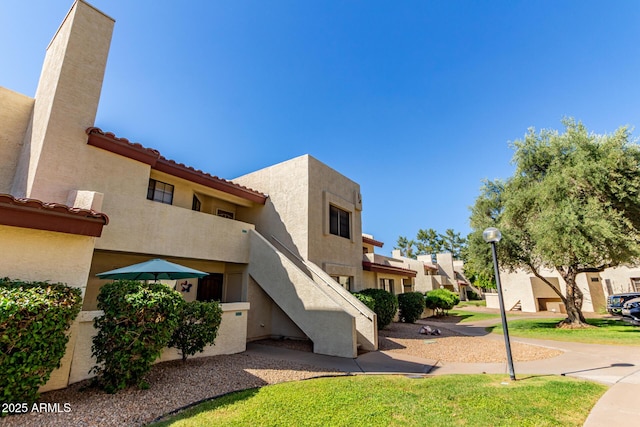 2020 W Union Hills Dr Unit 156, Phoenix, AZ 85027 - view of property featuring stairway