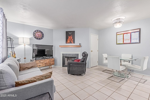 2020 W Union Hills Dr Unit 156, Phoenix, AZ 85027 - living room featuring light tile patterned floors and a fireplace
