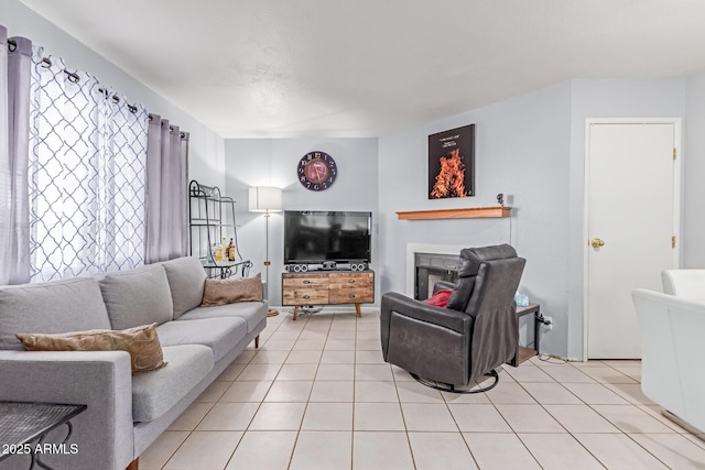 2020 W Union Hills Dr Unit 156, Phoenix, AZ 85027 - living area with light tile patterned floors and a fireplace