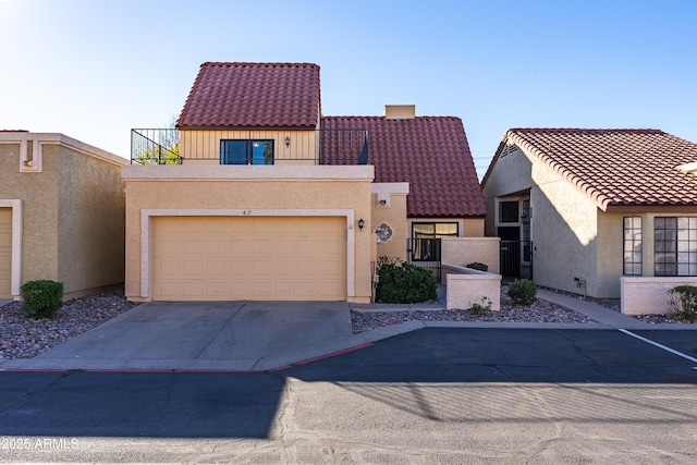 view of front of property with a garage