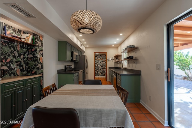 tiled dining space with sink