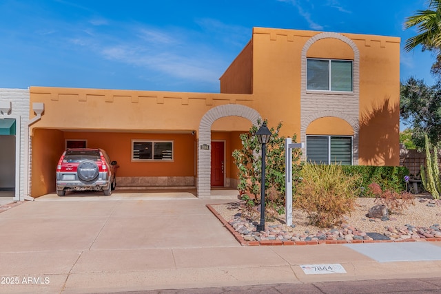 view of front of house featuring a carport