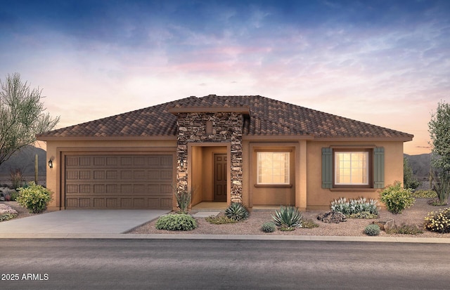 view of front of house featuring stucco siding, concrete driveway, a garage, stone siding, and a tiled roof