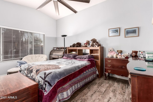 bedroom featuring vaulted ceiling and hardwood / wood-style floors