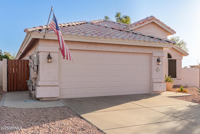 view of front of property featuring a garage