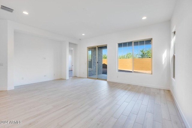 empty room featuring light hardwood / wood-style floors