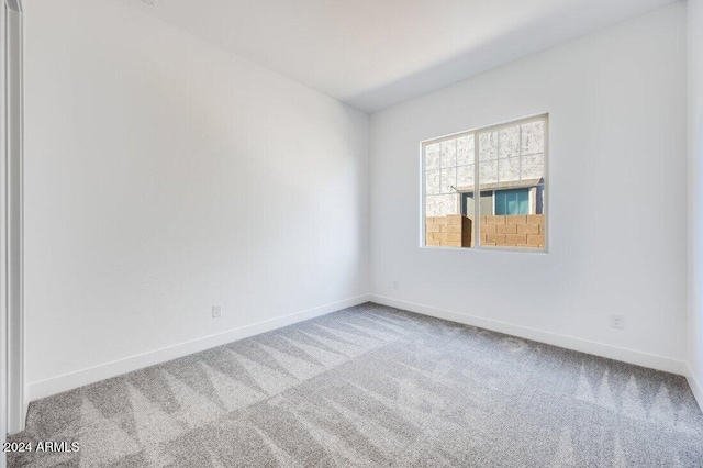 spare room with carpet flooring