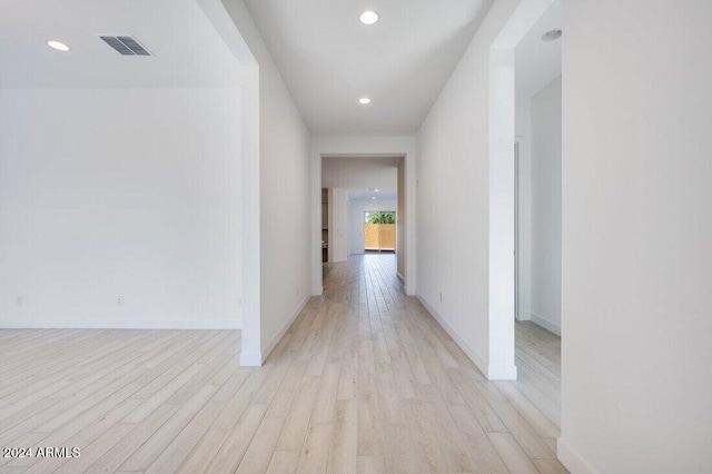 hallway featuring light hardwood / wood-style flooring