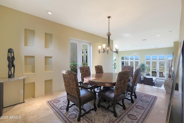 dining room featuring a chandelier