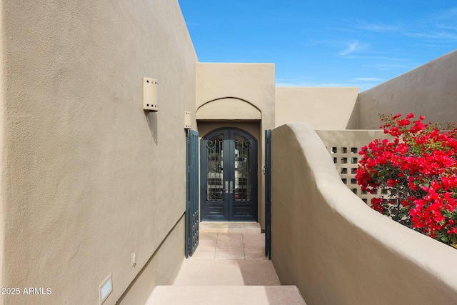 view of exterior entry with french doors