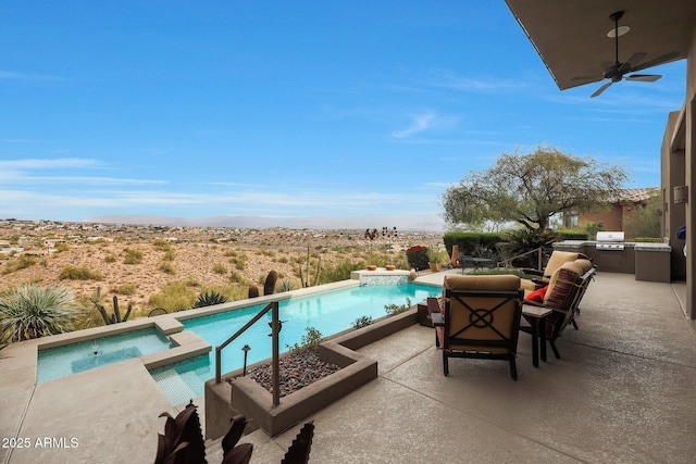 view of swimming pool with an in ground hot tub, area for grilling, ceiling fan, exterior kitchen, and a patio area