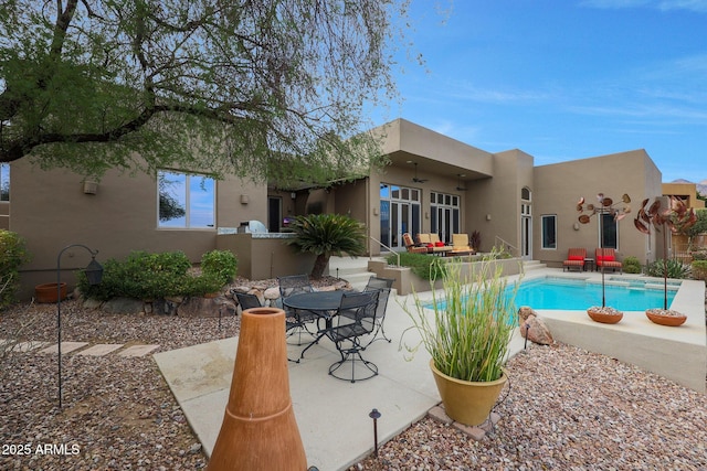 view of pool featuring a patio