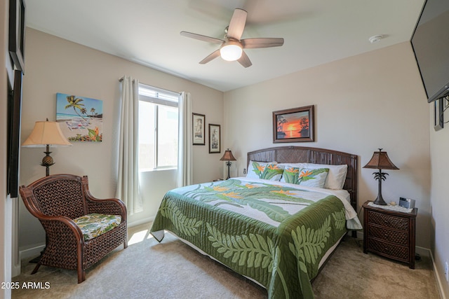bedroom with carpet floors, baseboards, and a ceiling fan
