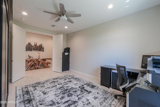 office featuring a ceiling fan, recessed lighting, wood finished floors, and visible vents