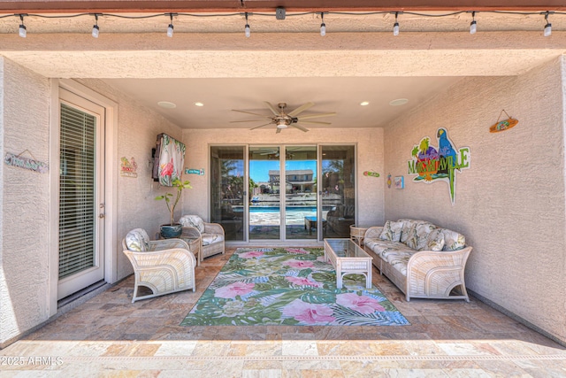 view of patio / terrace featuring an outdoor hangout area and a ceiling fan