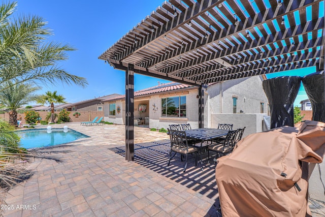view of patio / terrace featuring a fenced in pool, outdoor dining area, fence, and a pergola