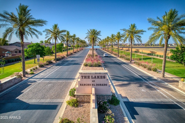 view of road with curbs and sidewalks